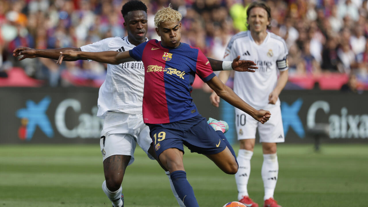 Ilustrasi - Pemain Barcelona Lamine Yamal dan Pemian Real Madrid Vinicius Junior